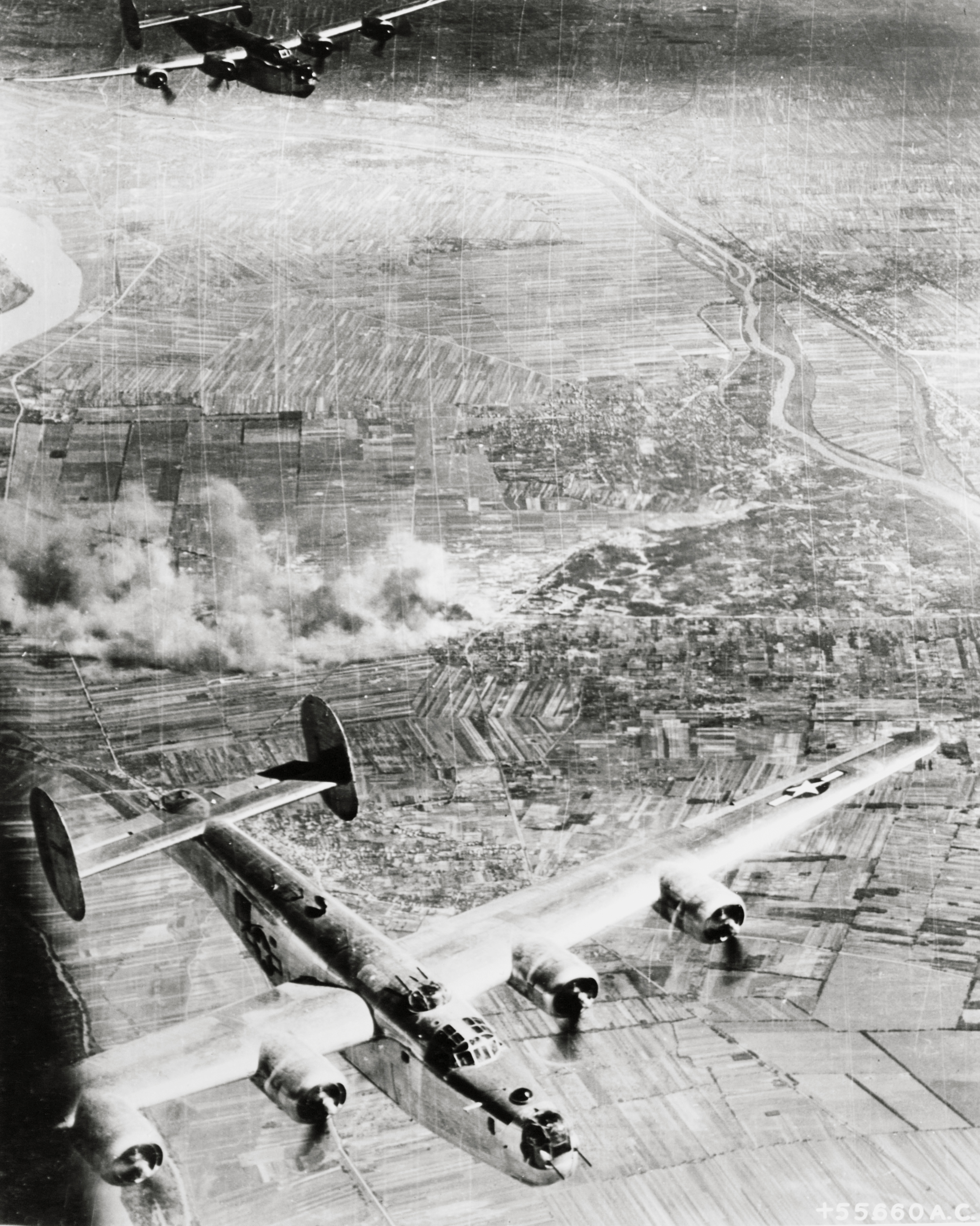 Target 15AF B-24 Liberators 464BG bomb the Tokal airdrome Budapest Hungary 6th Jan 1945 02
