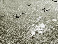 Asisbiz 42-52464 B-24H Liberator 15AF 465BG783BS Rough and Ready over rail yards Forli Italy 19th May 1944 01