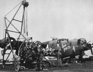 Asisbiz 41-29350 B-24H Liberator 8AF 466BG785BS 2UW getting a new 3 engine after the 27th May 1944 mission 01