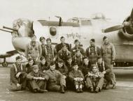 Asisbiz 42-50791 B-24J Liberator 8AF 466BG787BS 6LB Judy Sue with crew and nose art left side England 01