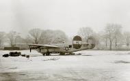 Asisbiz 42-51699 B-24J Liberator 8AF 466BG784BS T9M Duffy’s Tavern parked winter 01