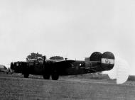 Asisbiz 42-52597 B-24H Liberator 8AF 466BG786BS U8W Lady Lightning nose art left side England 01