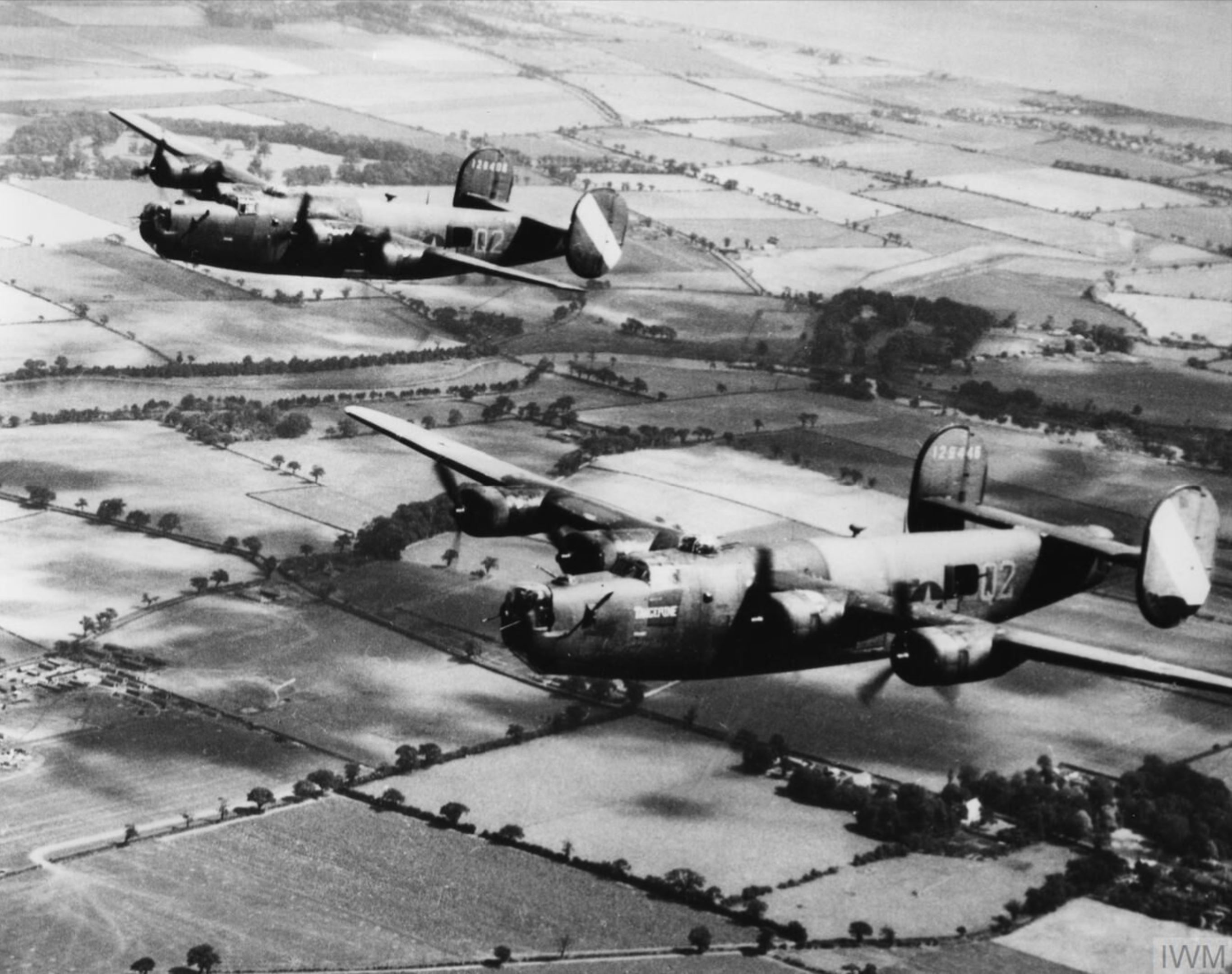 41-29446 B-24H Liberator 8AF 467BG790BS Q2P Tangerine in flight with Q2C FRE2000