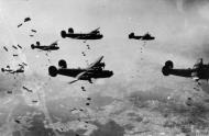 Asisbiz Target B-24 Liberators 467th Bomb Group dropping their bomb loads over the drop zone FRE8474