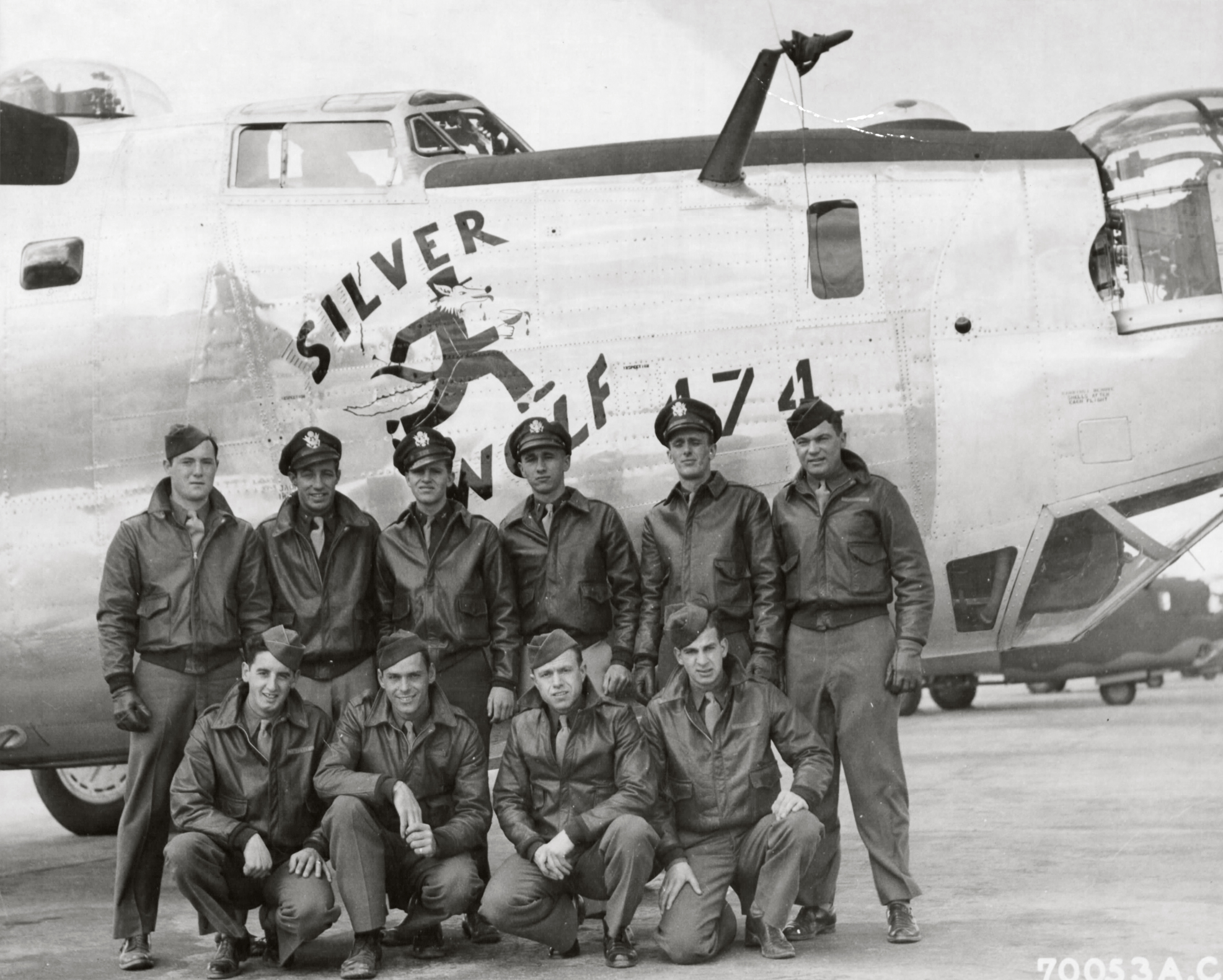 41-28882 B-24H Liberator 8AF 490BG848BS 7WL Silver Wolf with crew and nose art right side England 1944 01
