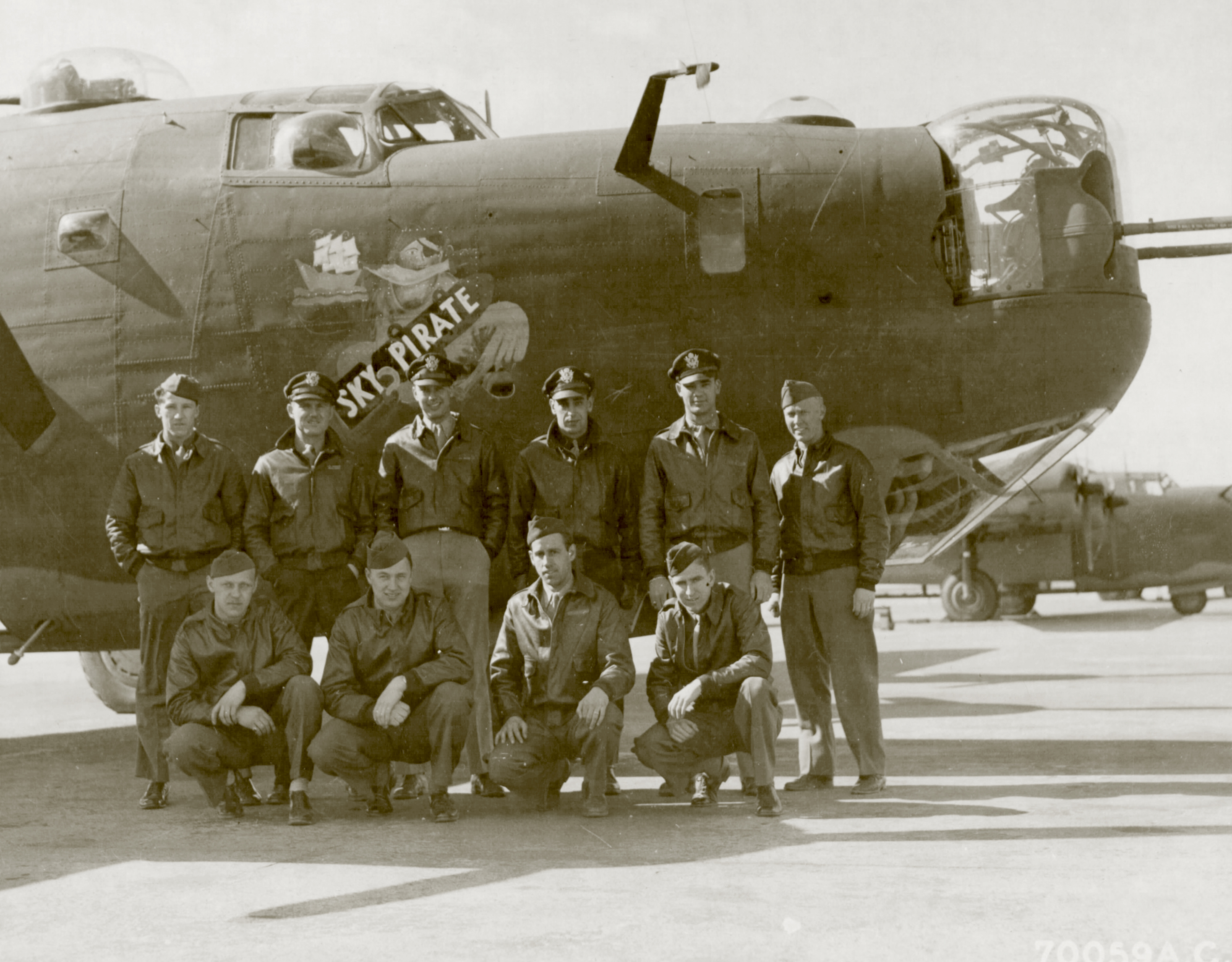42-94823 B-24H Liberator 8AF 490BG848BS 7WI Sky Pirate with crew nose art right side 01