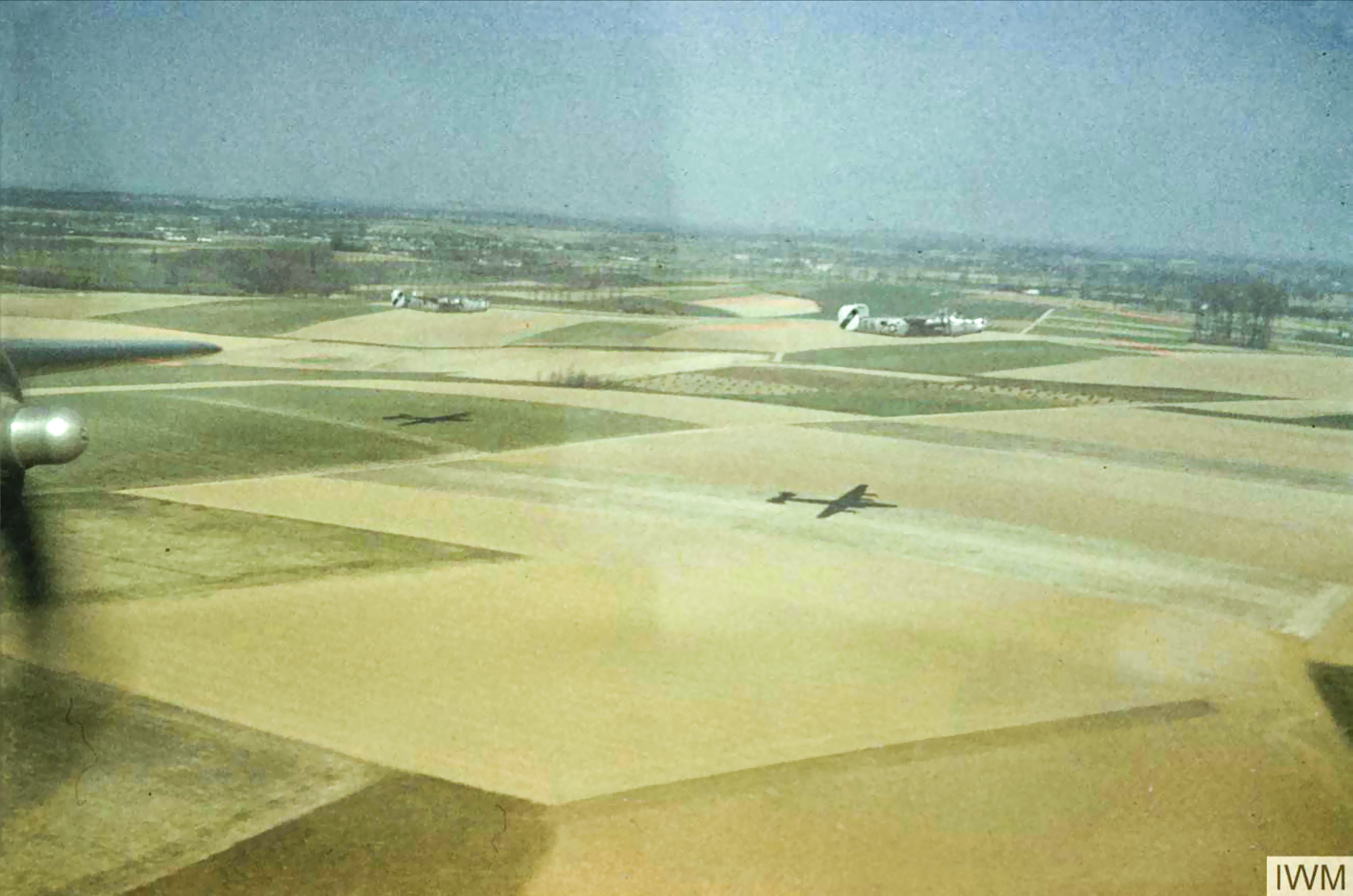 Consolidated B-24J Liberators 8AF 491BG fly low over the English countryside 24th Mar 1945 FRE6881