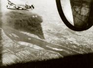 Asisbiz 42-51258 B-24J Liberator 8AF 492BG856BS 5ZN over Rhenania Ossag oil refinery 6th Aug 1944