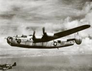 Asisbiz 44-40437 B-24J Liberator 8AF 493BG861BS E Hairless Joe escorted by 357FG P 51 Mustangs B6F and B6G FRE2154