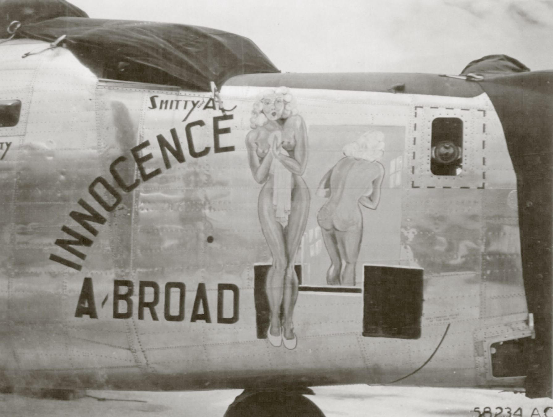 44-40733 B-24J Liberator 7AF 494BG865BS 733 Innocence A Broad nose art right side 01