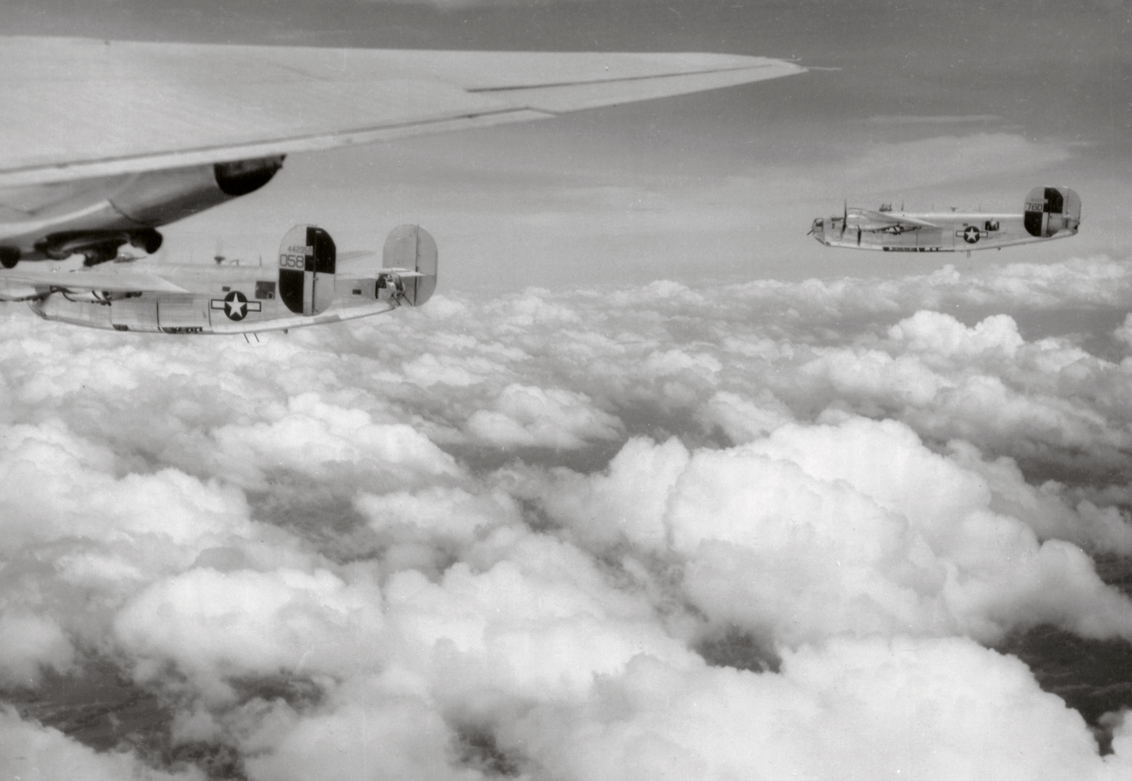 44-40760 B-24J Liberator 7AF 494BG867BS 760 Black Sheep in formation with 758 over Mindanao Philippines 11th Mar 1945 01