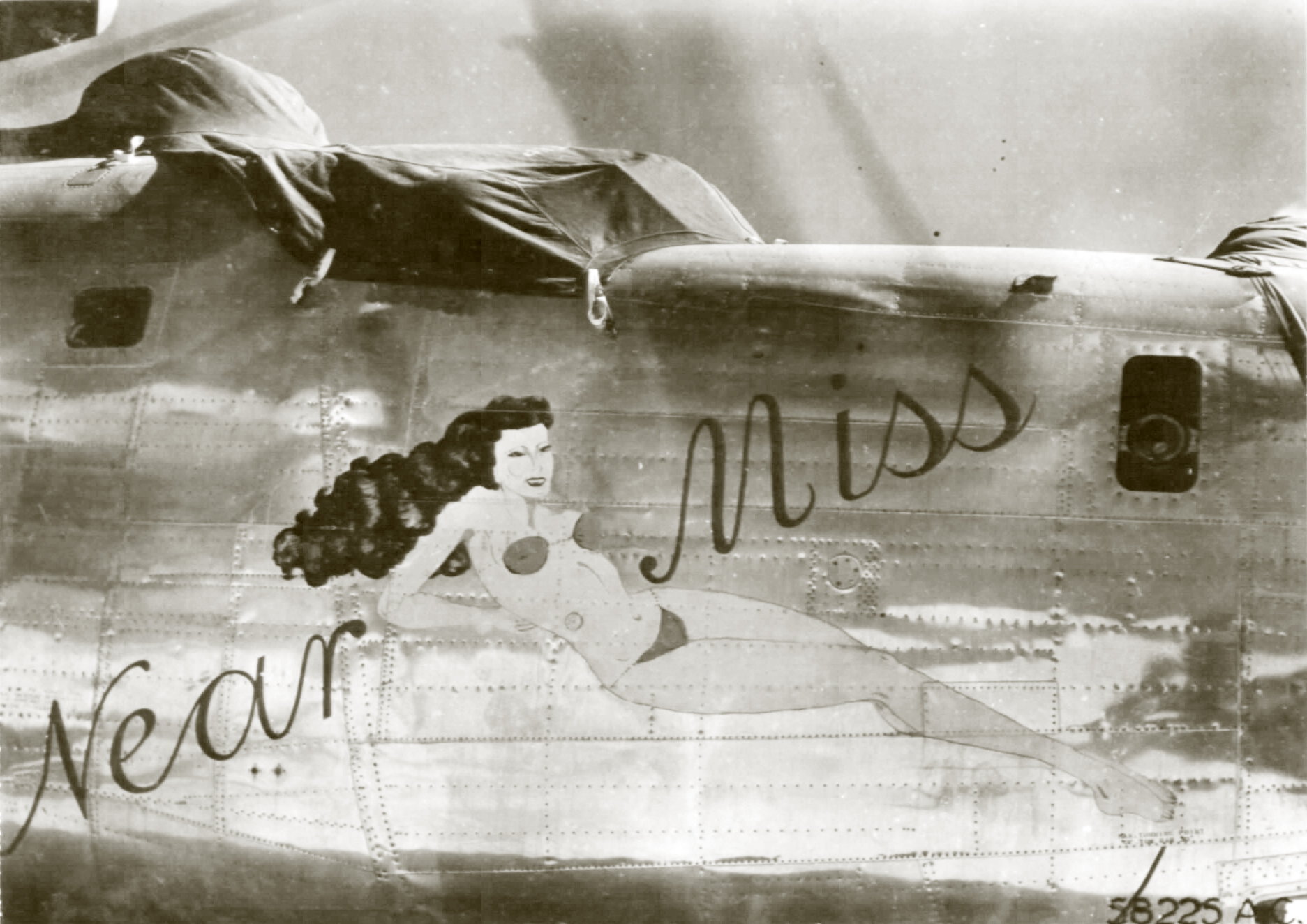 44-40795 B-24J Liberator 7AF 494BG867BS 795 Near Miss nose art right side 01