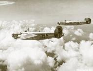 Asisbiz 44-40647 B-24J Liberator 7AF 494BG867BS 647 Lady Kaye in formation with 759 over Mindanao Philippines 01