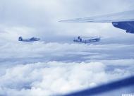 Asisbiz 44-40749 B-24J Liberator 7AF 494BG867BS 749 Flying Boxcar with 759 enroute to Cebu Philippines 6th Dec 1944 NA911