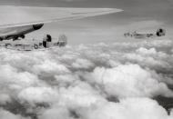 Asisbiz 44-40758 B-24J Liberator 7AF 494BG867BS 758 Brief in formation with 760 over Mindanao Philippines 11th Mar 1945 01