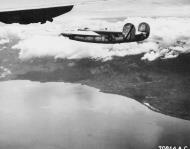 Asisbiz 44-42057 B-24M Liberator 7AF 494BG865BS 057 The Bull II in formation over Mindanao Philippines 01