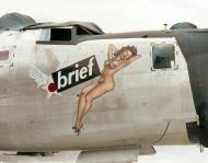 Asisbiz 44-42058 B-24M Liberator 7AF 494BG867BS 058 Brief nose art right side 01