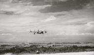 Asisbiz Consolidated B-24 Liberator 7AF 494BG865BS take off from Yontain Airstrip Okinawa 27th July 1945 01