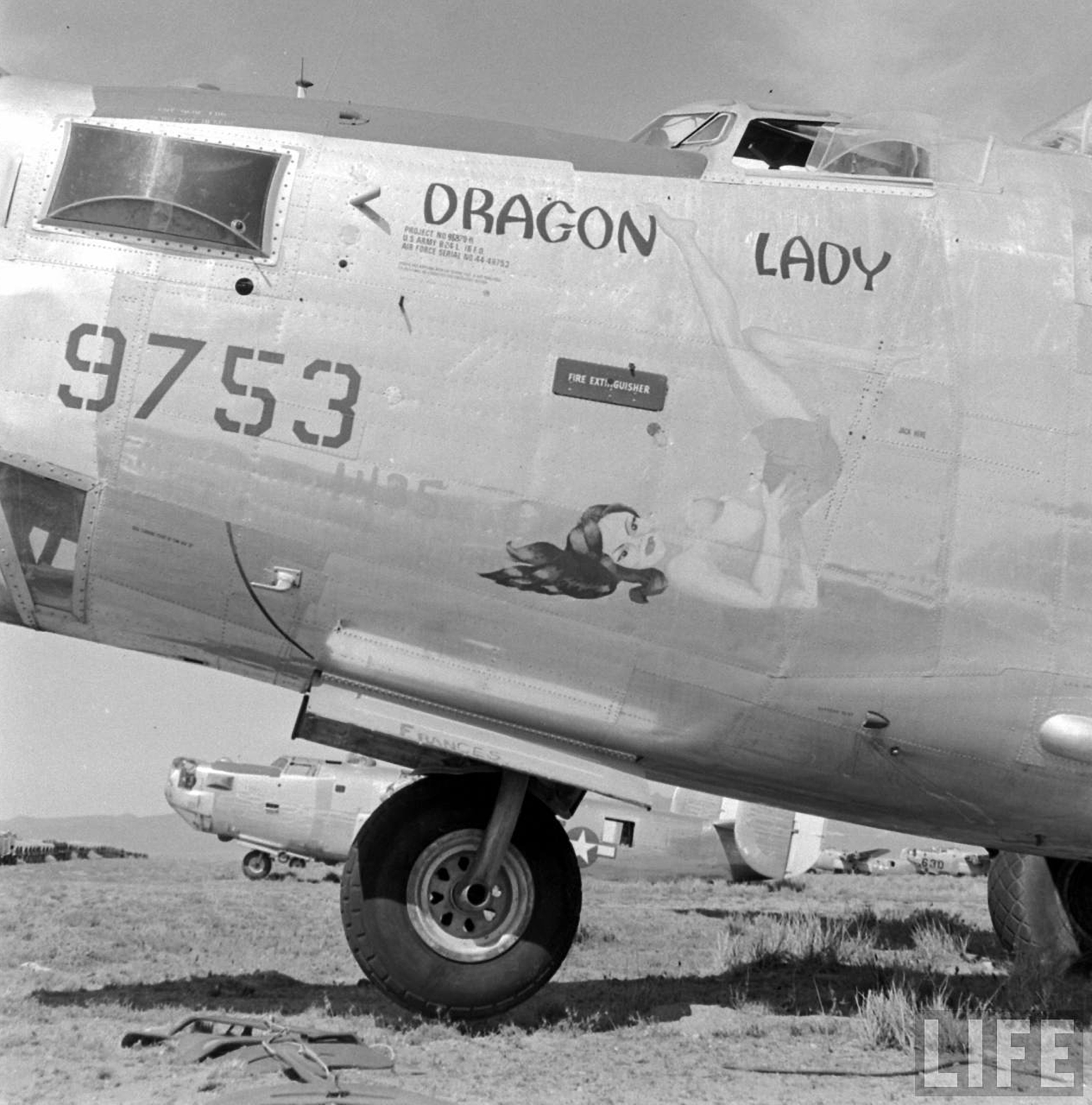 44-49753 B-24L Liberator 7AF 13AF FEAF 5BG23BS Dragon Lady nose art left side Kingman USA 1947