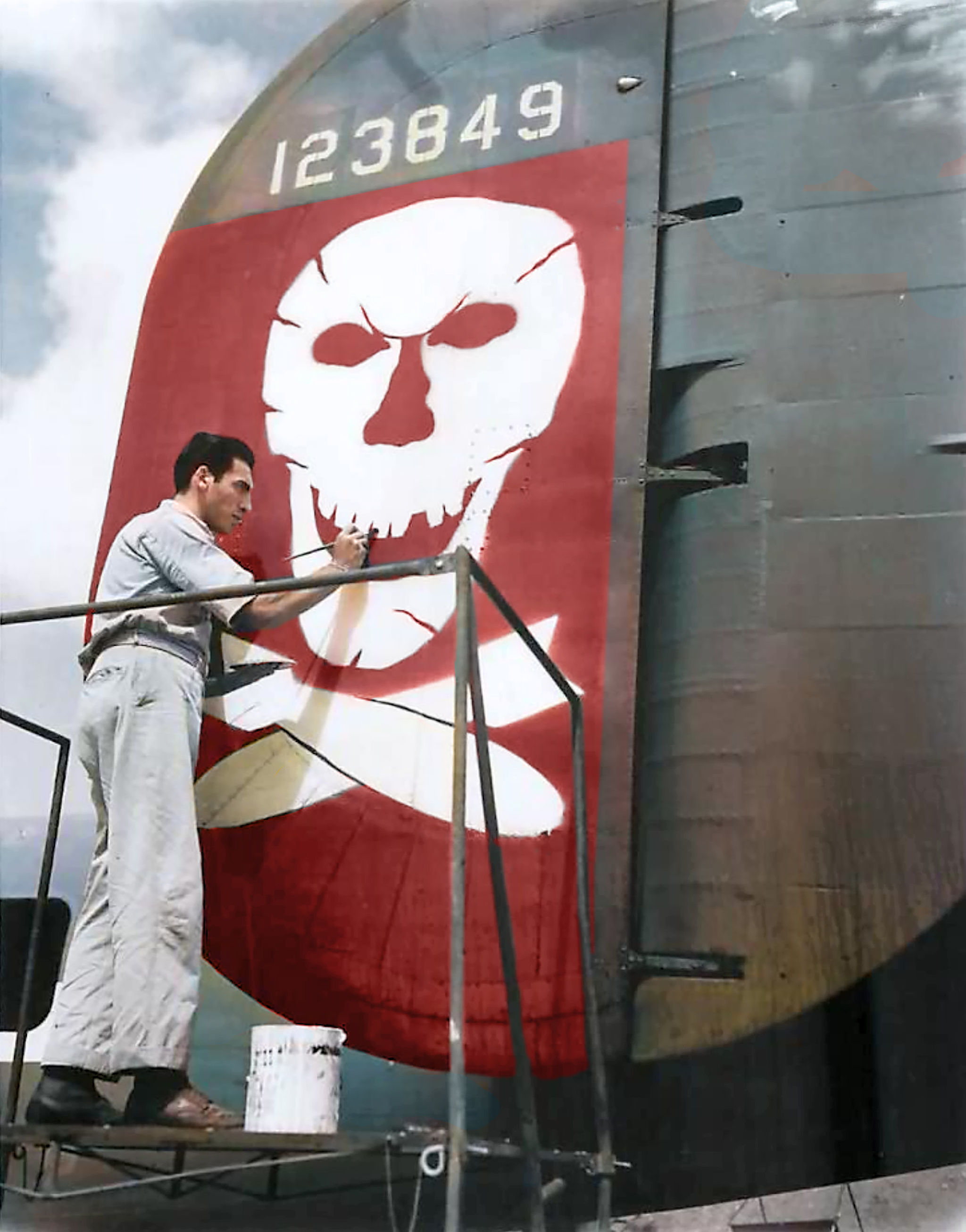 41-23849 B-24D Liberator 5AF 90BG320BS The Eager Beaver tail unit emblem being applied 01