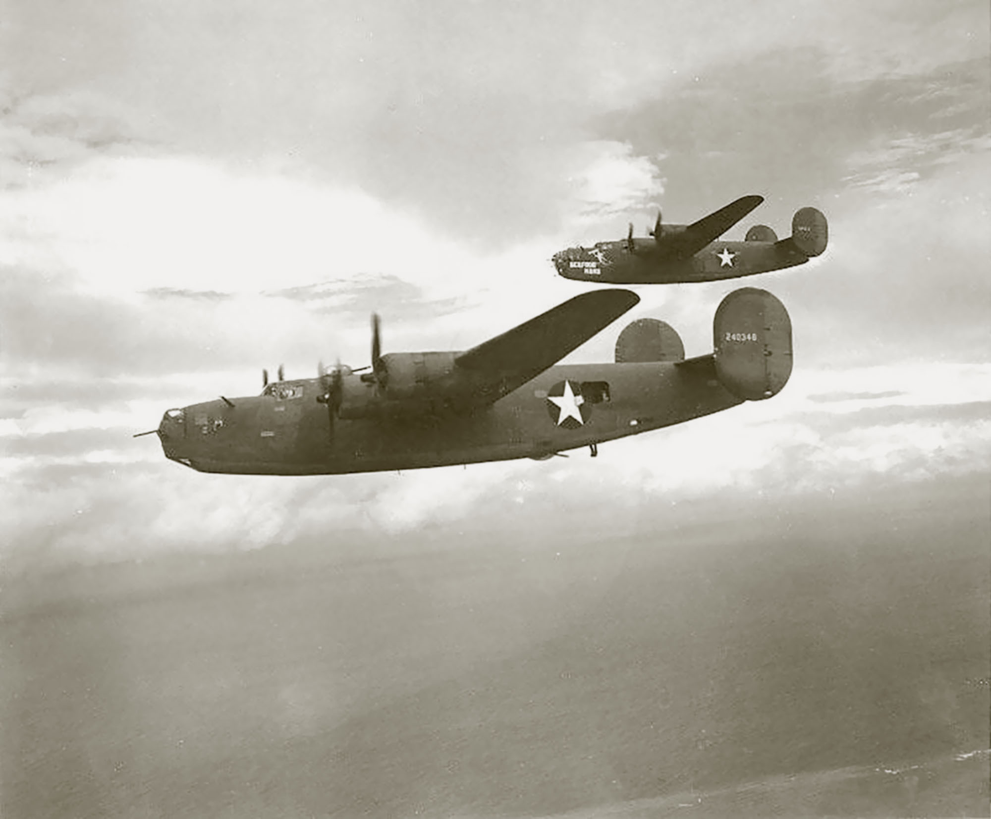 42-40348 B-24D Liberator 5AF 90BG400BS Twin Niftys in formation 01