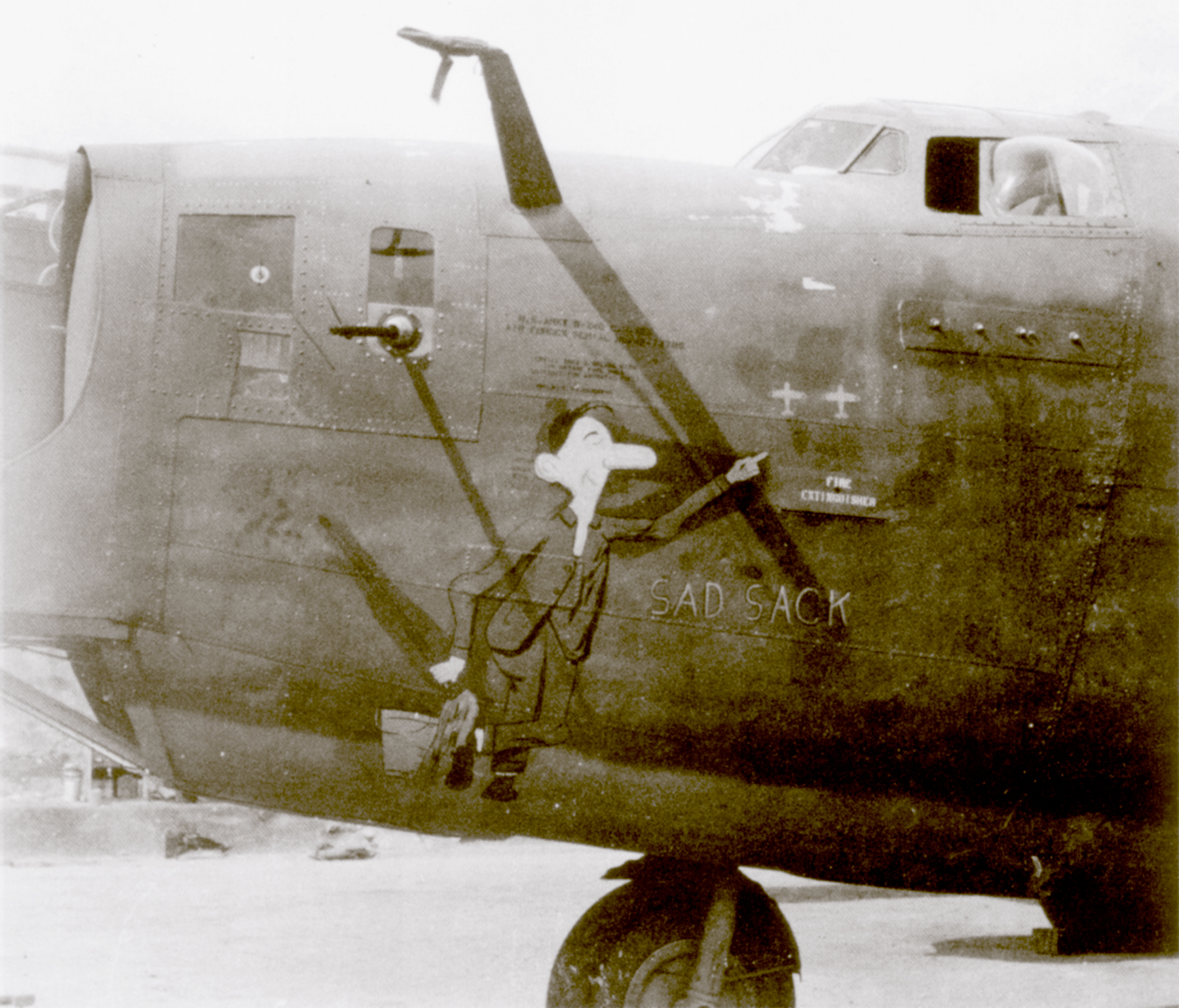 42-72785 B-24D Liberator 5AF 90BG320BS Sad Sack nose art left side in New Guinea 01