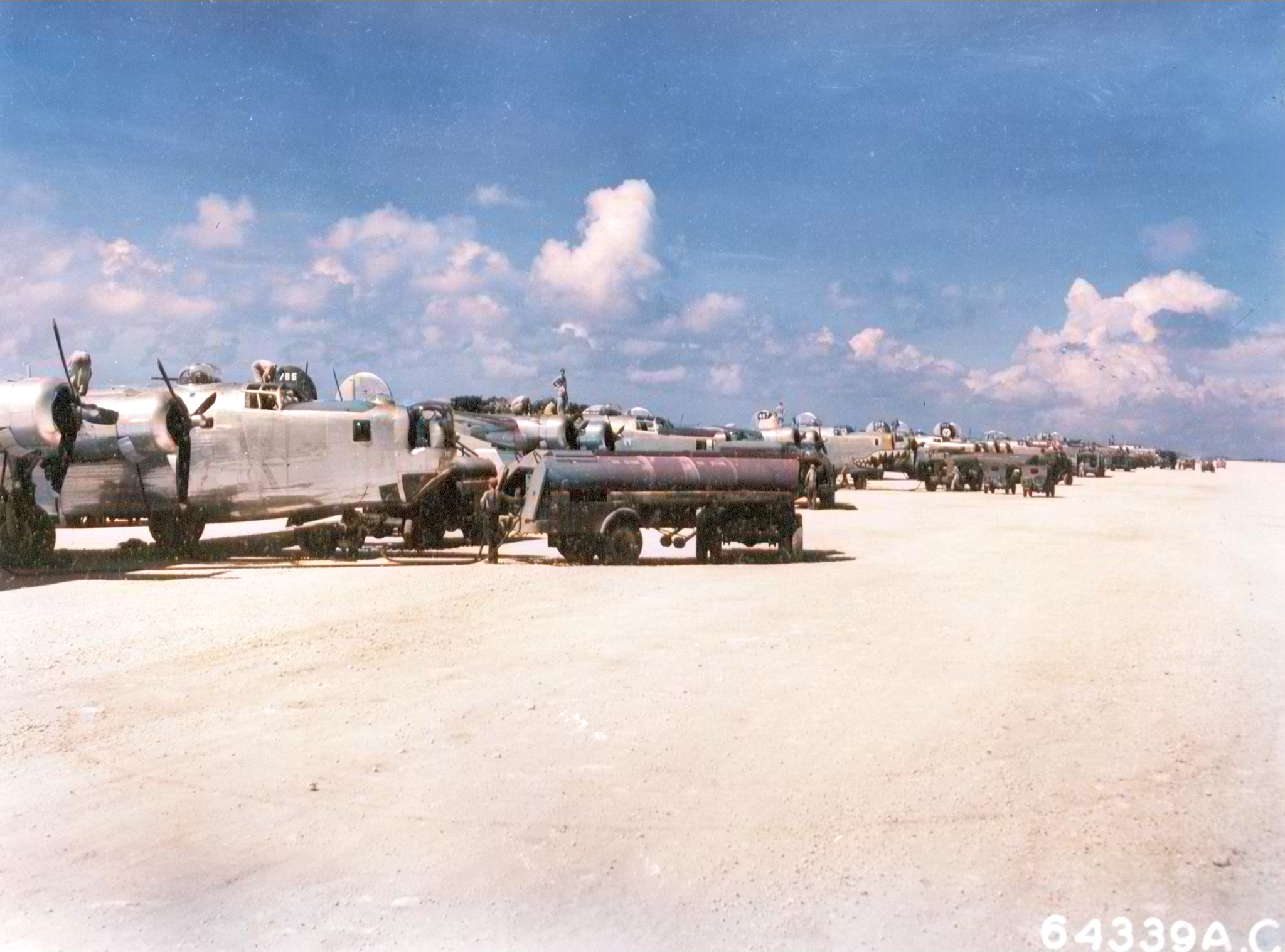 Consolidated B-24's Liberators 5AF 90BG and 380BG being refueled at Okinawa Ryukyu Retto 22nd July 1945 US 64339AC