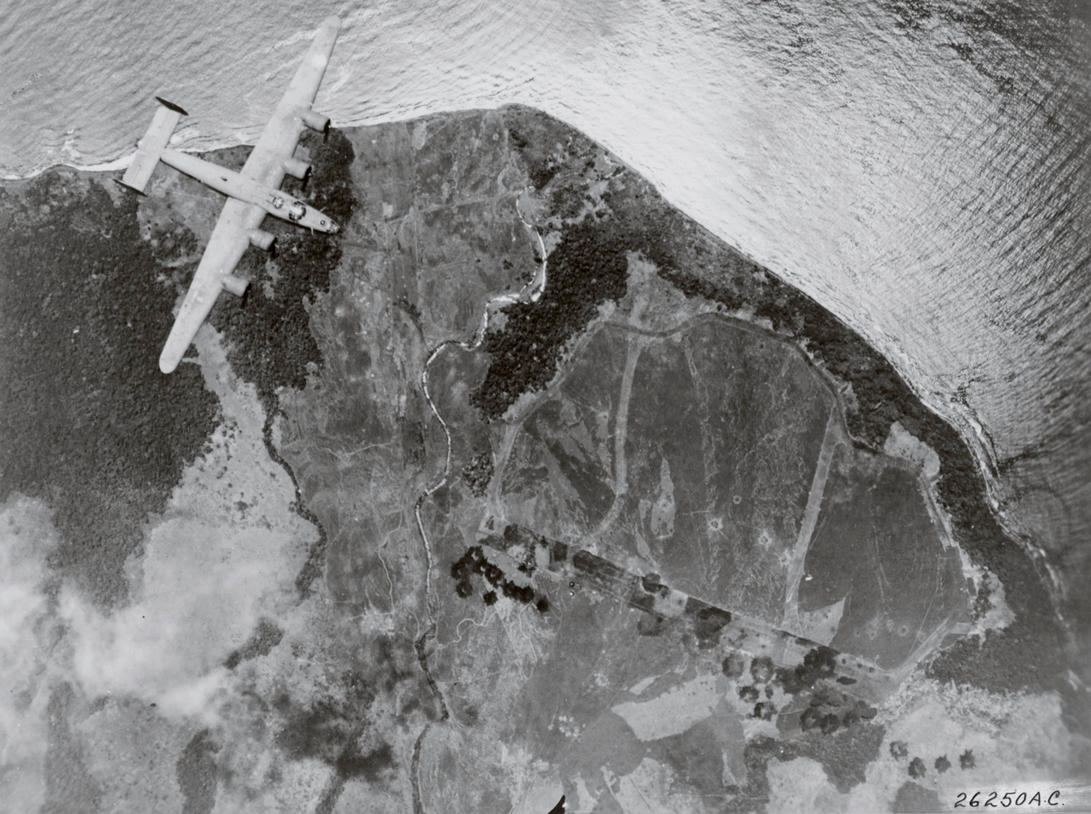 Consolidated B-24 Liberator 5AF over the Japanese airfield at Cape Gloucester New Britain 16th Oct 1943 01