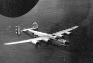 Asisbiz 42-109860 B-24J Liberator 5AF 90BG320BS aerial view of 860 in flight low over the ocean 01