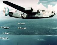 Asisbiz 44 40341 B 24J Liberator 5AF 90BG319BS 341 Maid in USA in flight nose art right side 01