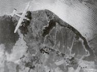 Asisbiz Consolidated B 24 Liberator 5AF over the Japanese airfield at Cape Gloucester New Britain 16th Oct 1943 01