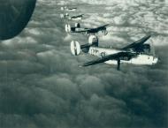 Asisbiz 44-40116 B-24J Liberator 8AF 93BG409BS YMV Tobasco Keeds with YMX flying in line formation 01