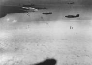 Asisbiz Consolidated B-24 Liberators 8AF 93BG drop their bombs over Ingolstadt Germany 1st Mar 1945 01