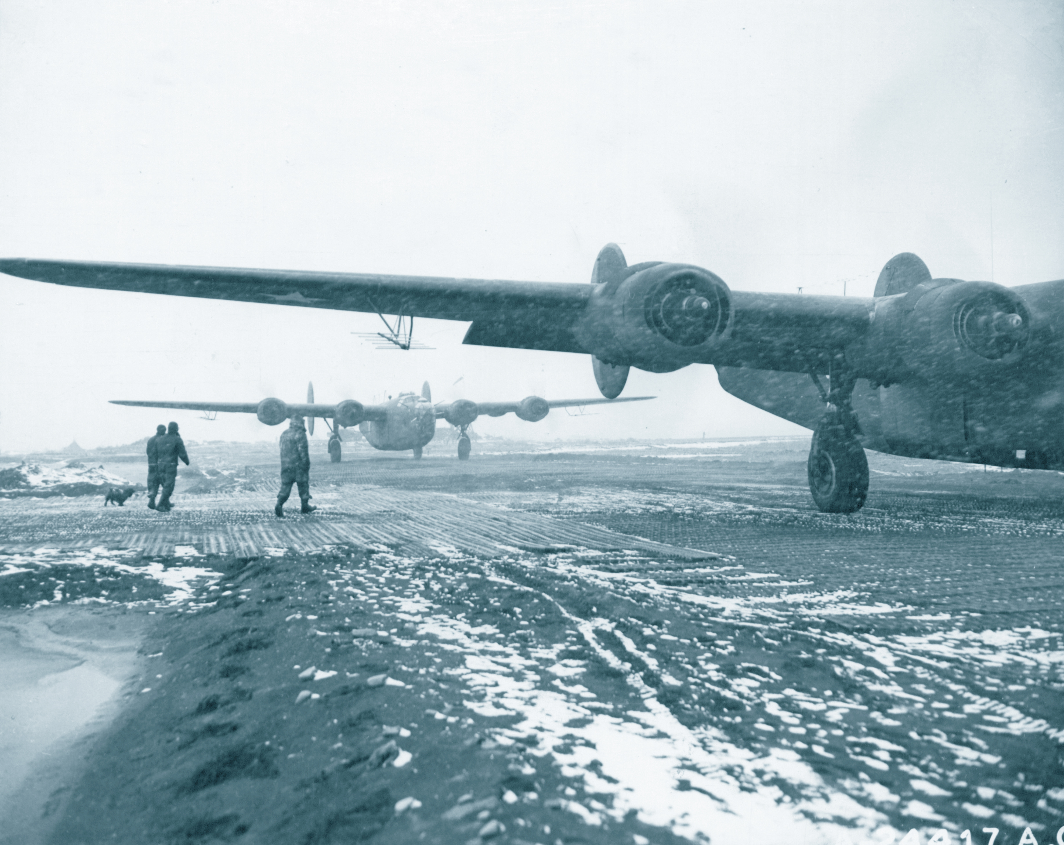 Consolidated B-24 Liberator 11AF 28BG landing in a snow storm after a raid Aleutian Islands 1943 NA1043