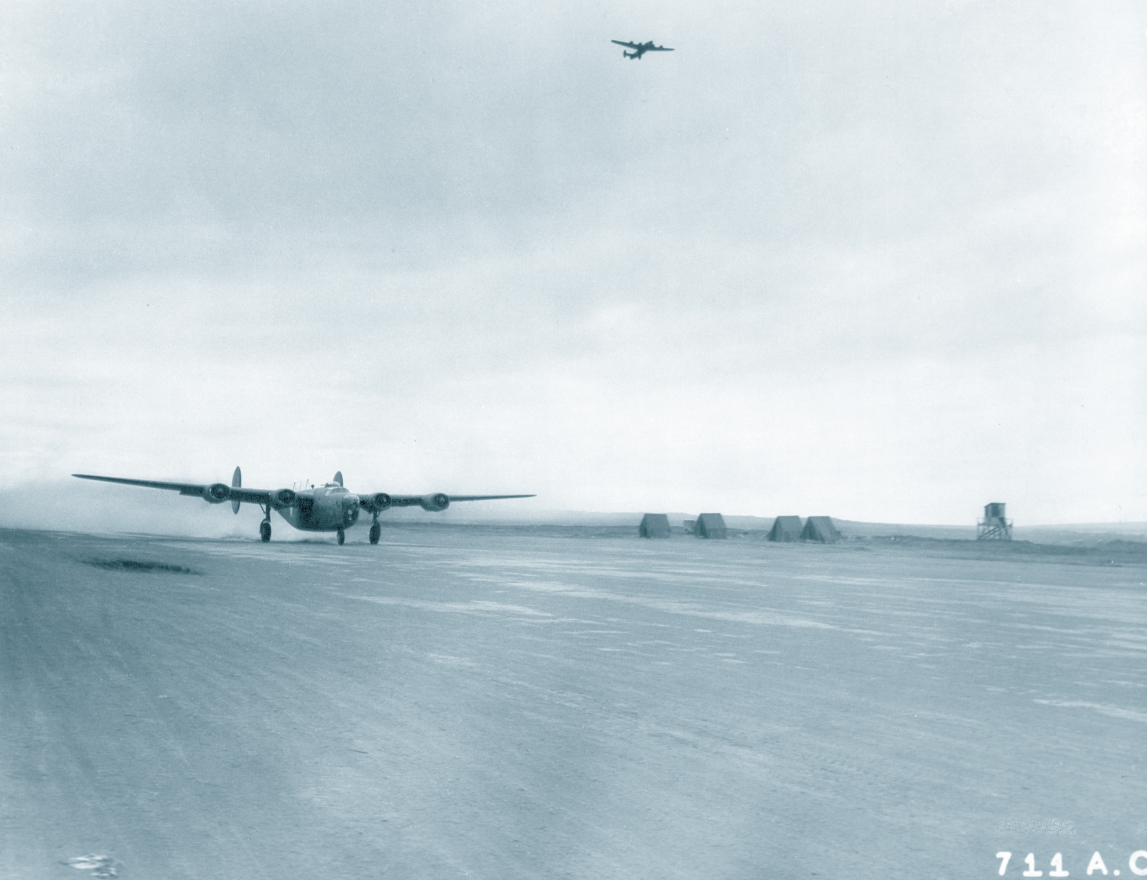 Consolidated B-24 Liberator 11AF 28BG taking off for its next mission Aleutian Islands 1942 NA1114