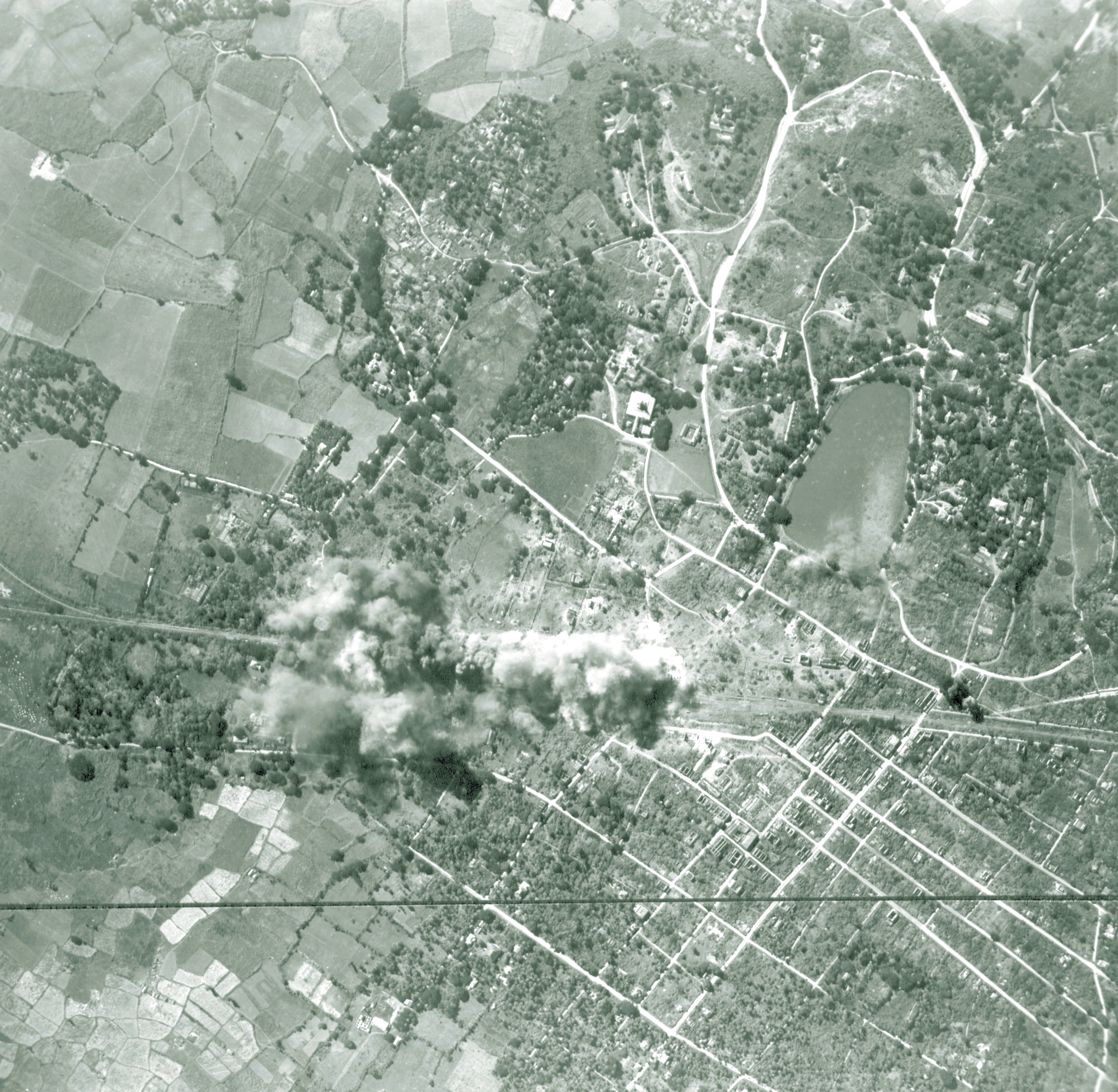 Target 10AF 7BG B-24 Liberators hit the railroad yards at Pyinmana Burma NA715