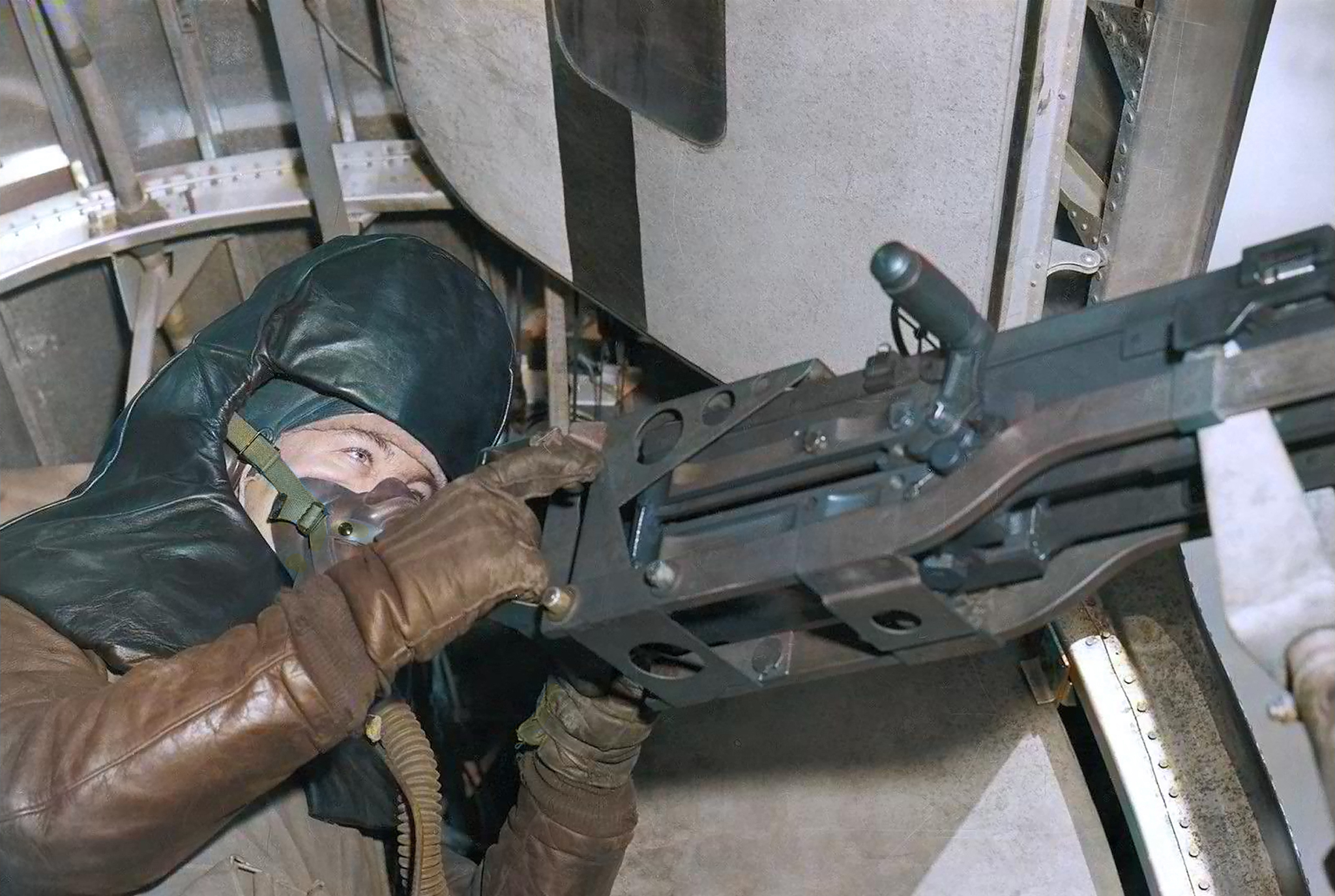 Crew air gunner defensive positions within the Consolidated B-24 Liberator 376BG waist gunner using armor 1944 01
