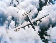 Asisbiz 2nd Air Division B-24 Liberator during an attack on German submarine yards at Kiel and Hamburg 4th April 1945 01