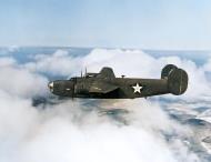 Asisbiz Consolidated B-24 Liberator early production model in flight over the USA 01