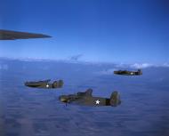 Asisbiz WWII color photo of USAAF 41-24102 B-24D Liberator during a training flight over America 01