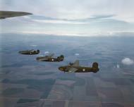 Asisbiz WWII color photo of USAAF 42-63764 B-24D Liberator during a training flight over America 02