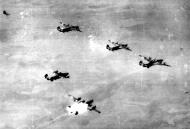 Asisbiz Target 15th Air Force 55BW B-24 Liberator over Oil Refinery at Blechhammer with one aircraft hit by flak 7th August 1944 01