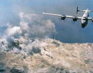 Asisbiz Target 15th Air Force 55BW B-24 Liberator over a enemy coastal town ASC1
