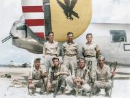 Asisbiz Consolidated F-7A Liberator 5AF 6PRG20CMS crew with Japanese sword gun souveniers from Okinawa 1945 01