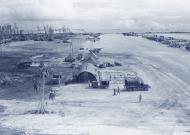 Asisbiz USAAF airbase at Angaur Island Caroline Islands with 5AF 22BG B-24 Liberators lined up on the strip 9th Dec 1944 NA115