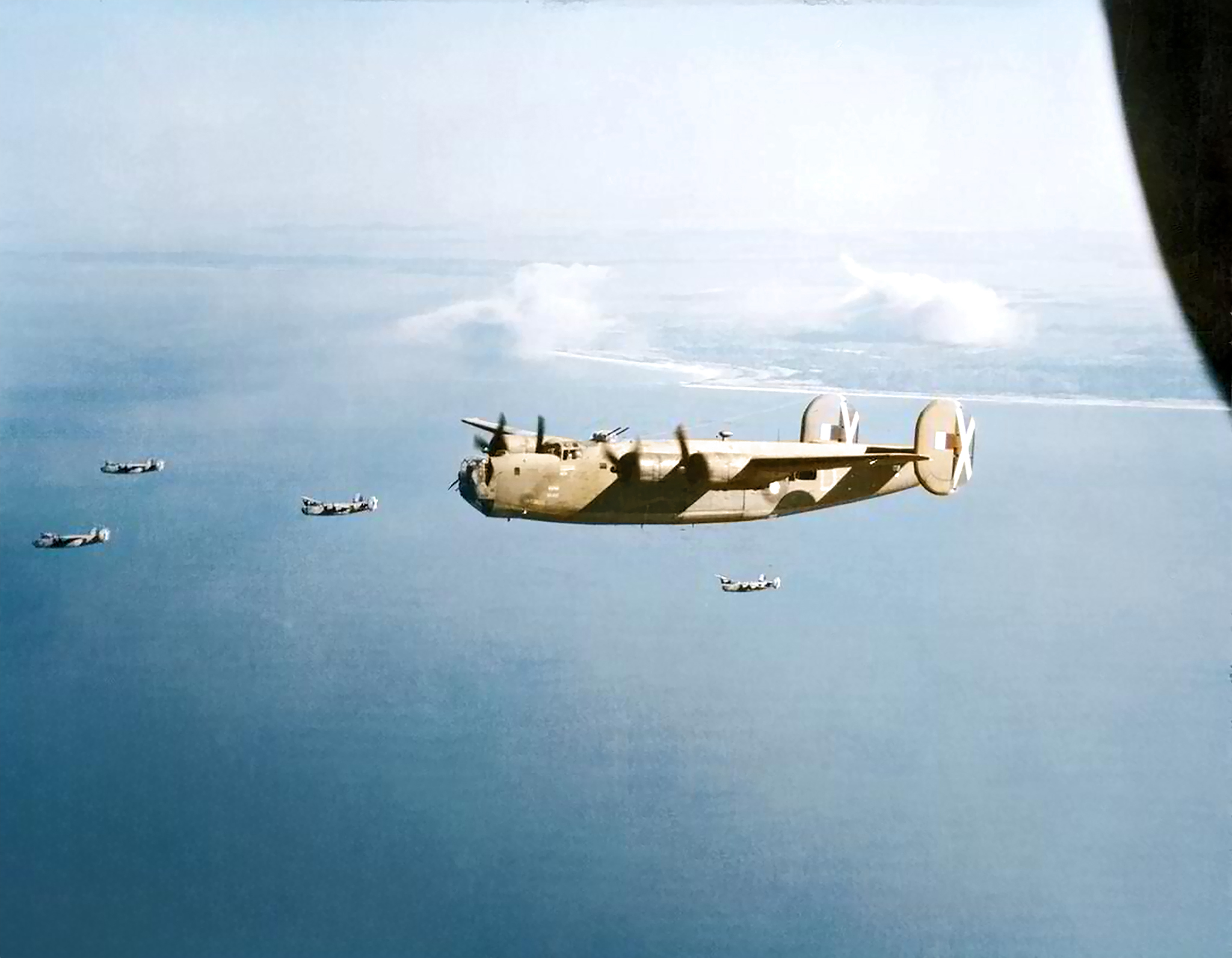 FMS Liberator BVIs RAF 356Sqn heading for their base at Salbani India after bombing Japanese positions on Ramree Island 21st Jan 1945 01