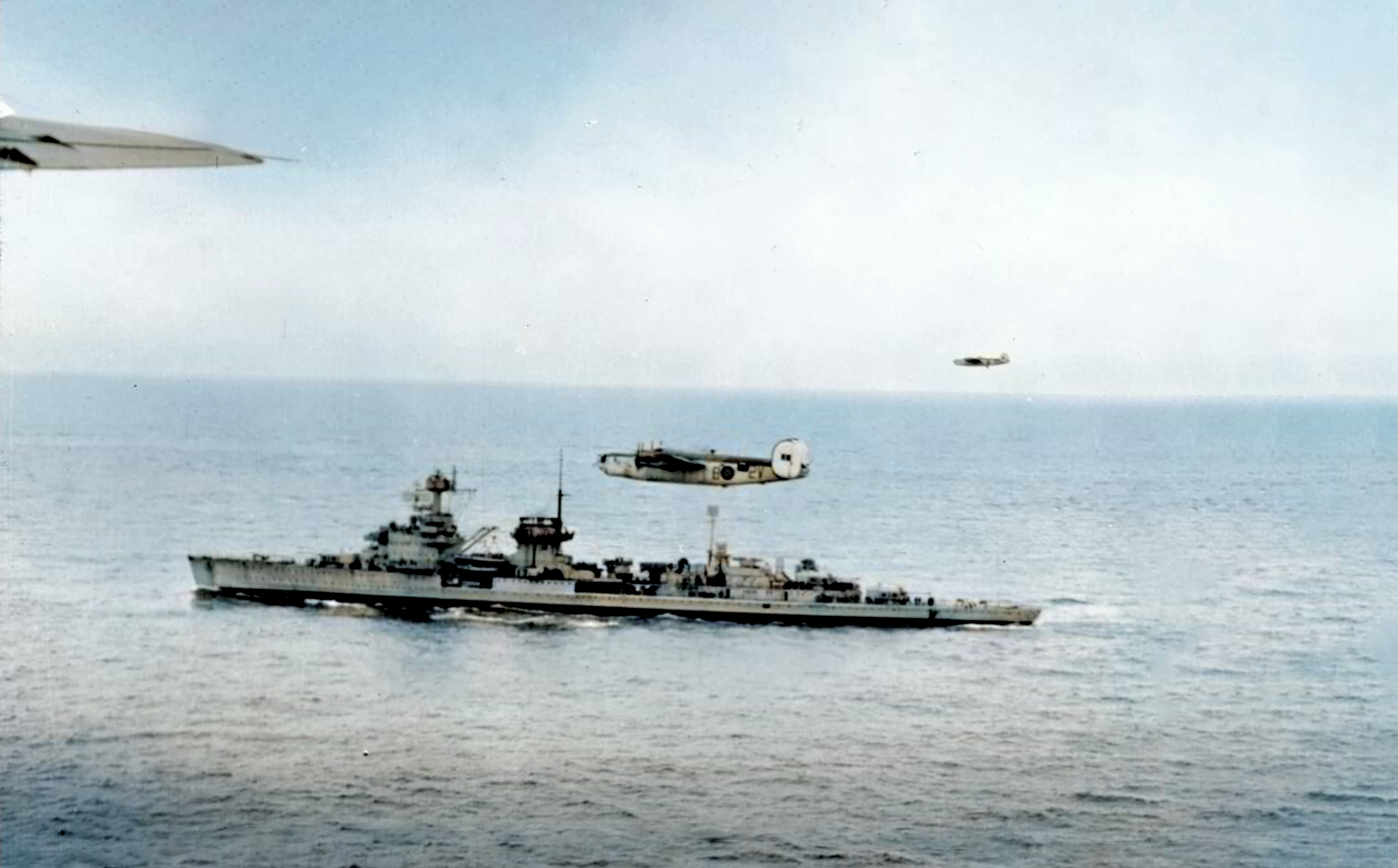 FMS Liberator GRIII RAF 547Sqn 2VE escorts German light cruiser Nurnberg sailing from Copenhagen to Wilhelmshaven after surrender 1945 IWM 01