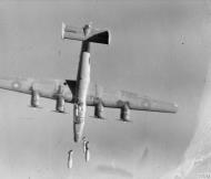 Asisbiz FMS B 24 Liberator BVI RAF 37Sqn KK320 V raid on ship yards at Monfalcone Italy 16th Mar 1945 IWM C5162