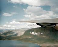 Asisbiz FMS Liberator GRIII RAF 120Sqn rounding the mountains of Iceland after taking off from Reykjavik to escort an Arctic convoy IWM 01