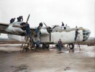 Asisbiz FMS Liberator III RAF 224Sqn during a daily inspection at Beaulieu in Hampshire Dec 1942 IWM 01